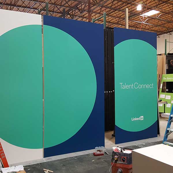 Exhibit wall wrap for a conference space