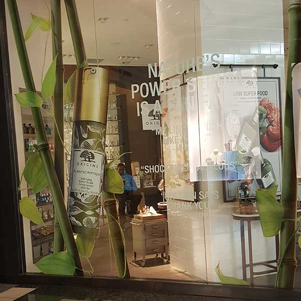 Optically clear window graphics on retail glass